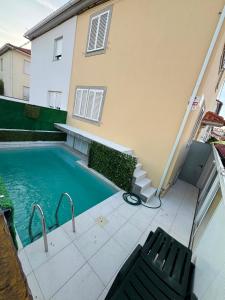 Casa cidade e piscina