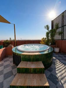 Luxury 4-BR Duplex with Private Rooftop & Jacuzzi in Guéliz