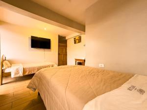 Hotel Qoyllur urcos