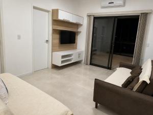 Estadia & Conforto - Ar, WiFi, Garagem, Praia 600m