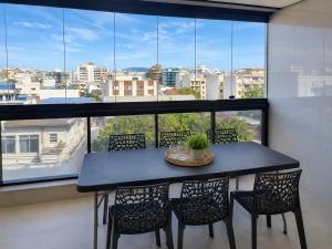 Estadia & Conforto - Ar, WiFi, Garagem, Praia 600m