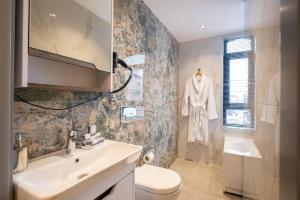 The Revia Square Hotel