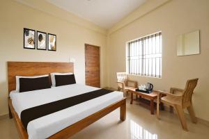 Hotel O Savi Rooms