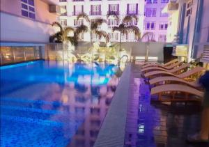 grand staycation manila Newport city
