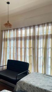 Casa Zo The Trio room with three single beds & balcony