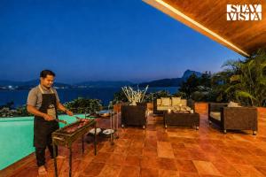 StayVista at Shambhala Lakeside - Infinity Pool & Karaoke