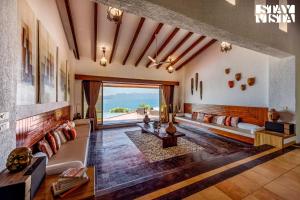 StayVista at Shambhala Lakeside - Infinity Pool & Karaoke