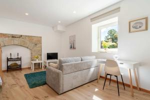 Stone Walls & Sunlit Terrace Retreat by HostWise