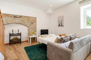 Stone Walls & Sunlit Terrace Retreat by HostWise
