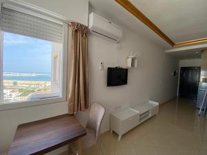 Cozy Beachfront Studio - Tangier Bay