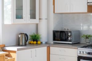 Green Studio Bielany Near the Metro by Noclegi Renters