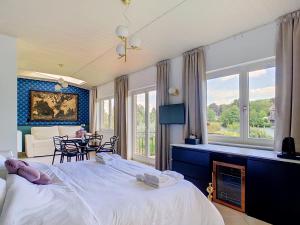 Villa Daisy - Suites élégantes et autonomes au bord de la Meuse