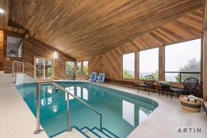 Stunning 4BR Retreat with Indoor Pool and Sauna