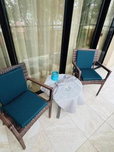 Private One-Bedroom Apartment with kitchen and balcony at a Hotel