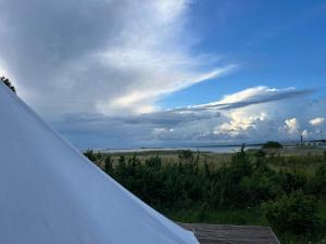 Private Sunset Off-grid tent with outdoor wc and cold shower