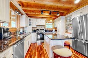 Tranquil Haven | Secluded waterfront house with sauna, dock, kayaks, canoe, gym