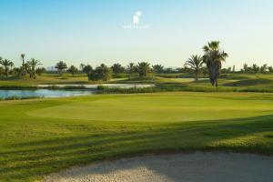 Ground floor apartment with pool In front of the golf course