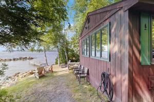 Cozy Lakefront Cottage with Dock, Mountain Views, Peaceful Location