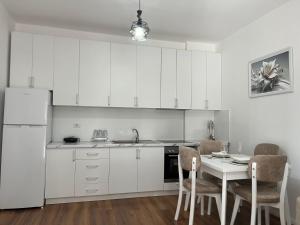 Apartamenti 33