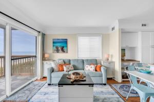 Oceanfront top-floor condo steps from the sand