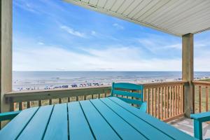 Oceanfront top-floor condo steps from the sand