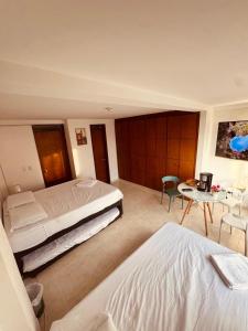 Casa Completa para 11 Huéspedes, 4 Habitaciones, Wifi y Cocina, Galán Deluxe