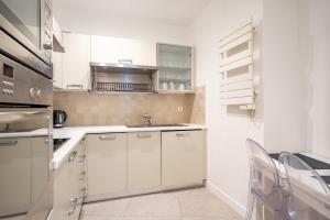 Prestige et Elégance aux Champs Elysees 80m2