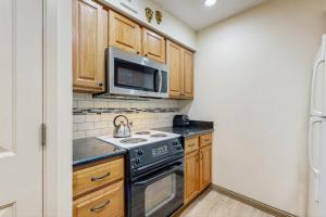 Two bedroom Townhome w loft private beach pools hot tub sauna resort fun