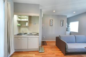 ZJ401 Top-Floor 1BR Home with Living Room and Kitchen, Double Bed and Sofa Bed