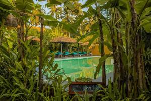 juSTa Morjim Beach Resort Goa - 80 Steps from Morjim Beach