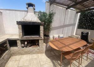Maisonnette climatisée avec extérieur et barbecue
