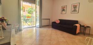 Casalú - Appartamento con Giardino Privato e Parcheggio Gratuito vicino Metro B