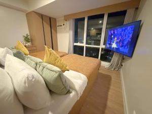 Abreeza Place Studio Unit 2 by Dacha Homestay