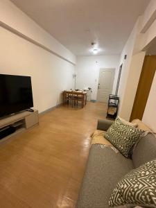 Cozy Urban Retreat in Burgos Circle, BGC