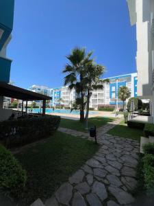 Elegant apartment inside the Arena Martil complex with a pool and many amenities