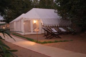 Kumbh India Kutir- Premium Swiss Tents & Cottages