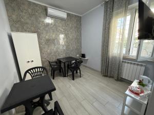 Camera privata con bagno privato e snack di benvenuto