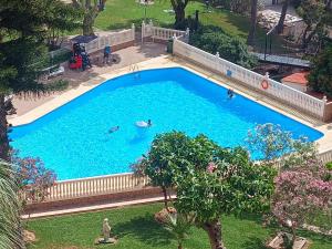 GRAN RESORT PLAYMON PARK jardines piscina pistas cerca PLAYA LEVANTE Reforma a estrenar