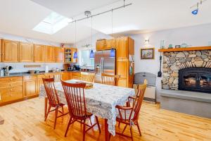 Secluded waterfront home with firepit, gas grill, kayaks, dock, balcony, & patio