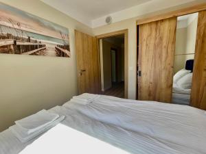 Słoneczny - baseny, sauny, jacuzzi, sala zabaw, do plaży 400m płaskie dojście