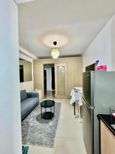 MOA 1BR Condo with Pool View &balcony Staycation2