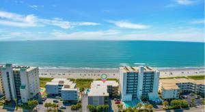 Oceanfront top-floor condo steps from the sand