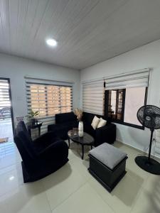 Casa bonita y cómoda con antejardín Barrio Jardín 2-4 personas
