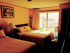 Queen Room with Two Queen Beds - Oceanfront room in The Moulton Hotel