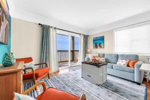 Oceanfront top-floor condo steps from the sand