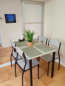 large room with 2double beds next to kuromon market