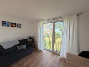 Ferienwohnung mit See und Alpenblick