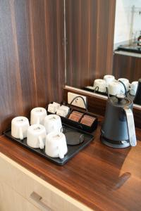 The Horizon Suite - 2BR with Balcony, Scenic Mountain View, Projector & Smart Toilet