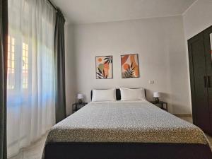 Casalú - Appartamento con Giardino Privato e Parcheggio Gratuito vicino Metro B