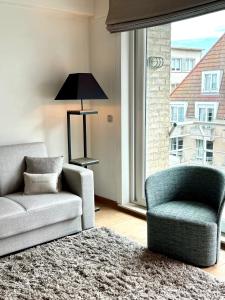 Seacast Oostende - vakantieappartement 2 slpk met terras en zijdelings zeezicht in centrum
